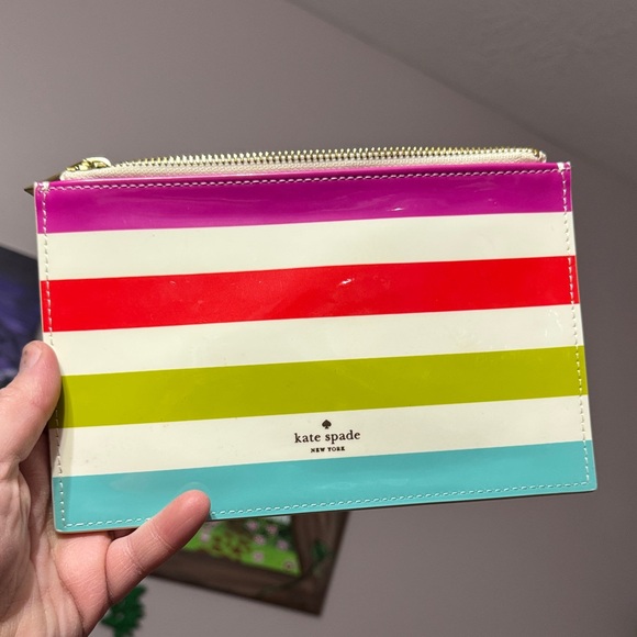kate spade Handbags - Kate Spade Multicolor Striped Clutch